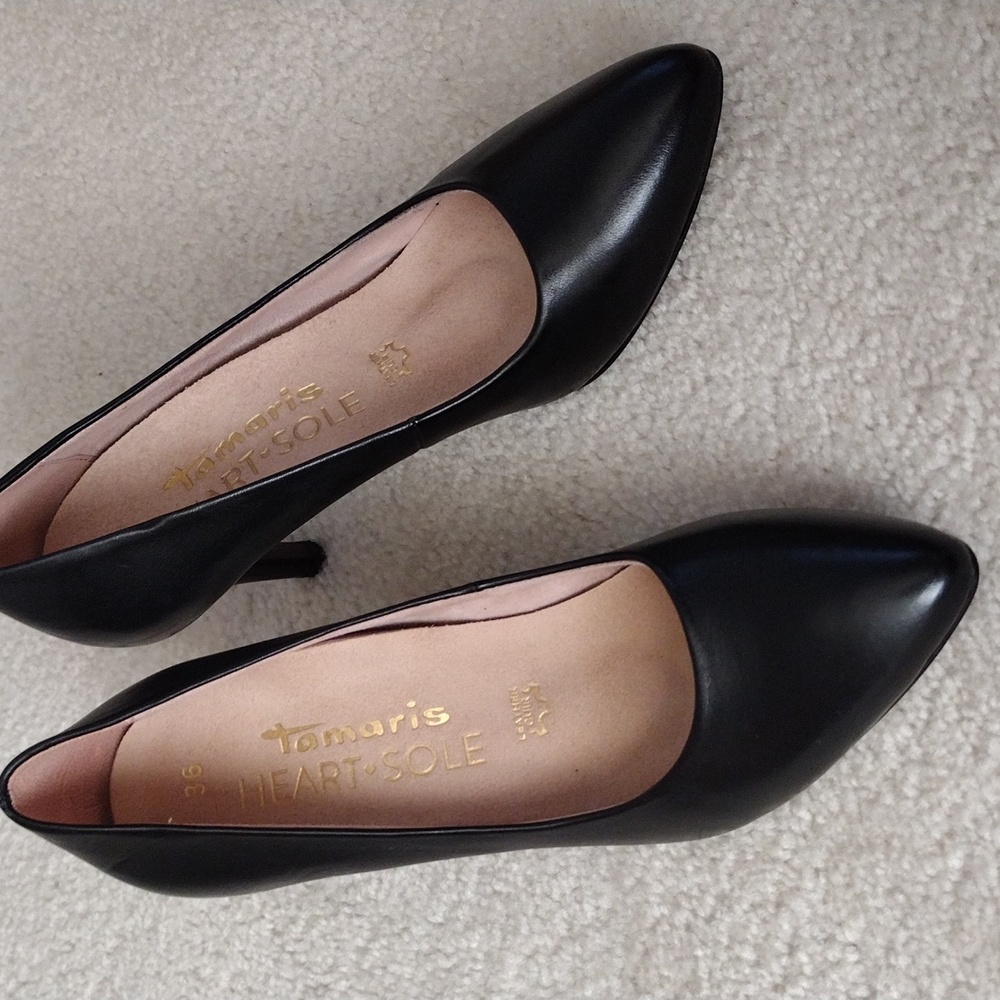 Heart Sole black leather heels. In great condition. Size 5.5